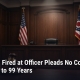 Fostoria News Courtroom with American and Ohio flags, empty judge's bench, and Fostoria Free Press logo.
